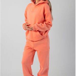 Comfrt Women's Orange Hoodie and Pants Set